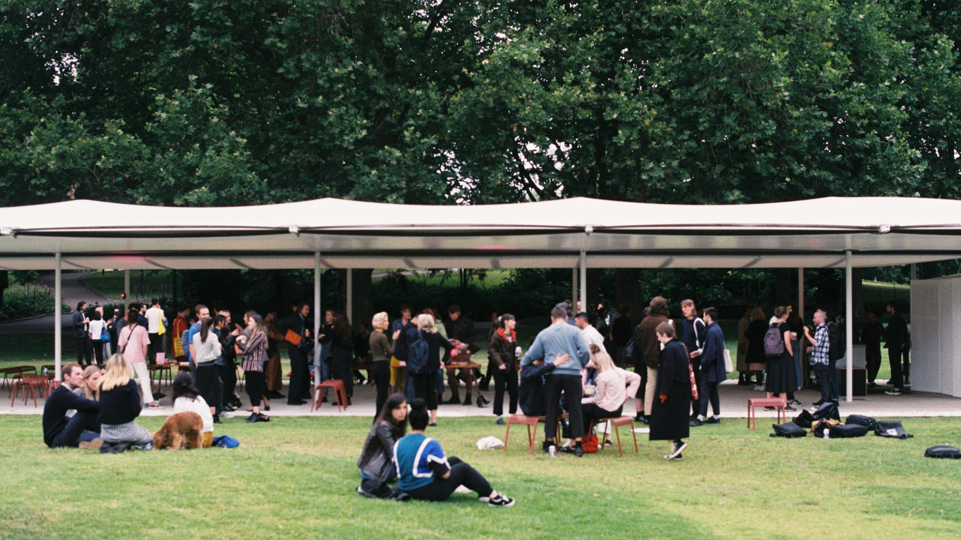 People gathering around a pavilion for a previous launch of the journal Caliper.